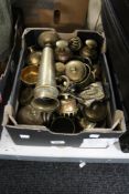 A box of brass ornaments