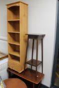 An Edwardian mahogany plant stand and lamp table