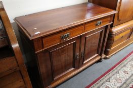 A 19th century mahogany inlaid sideboard fitted with two drawers.