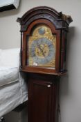 A nineteenth century mahogany longcased clock with brass and silvered dial