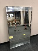 An all glass panel mirror