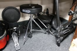 An electronic drum kit with stand,