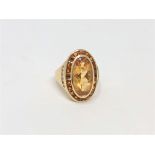A large 14ct gold citrine and diamond ring, size R CONDITION REPORT: 8.