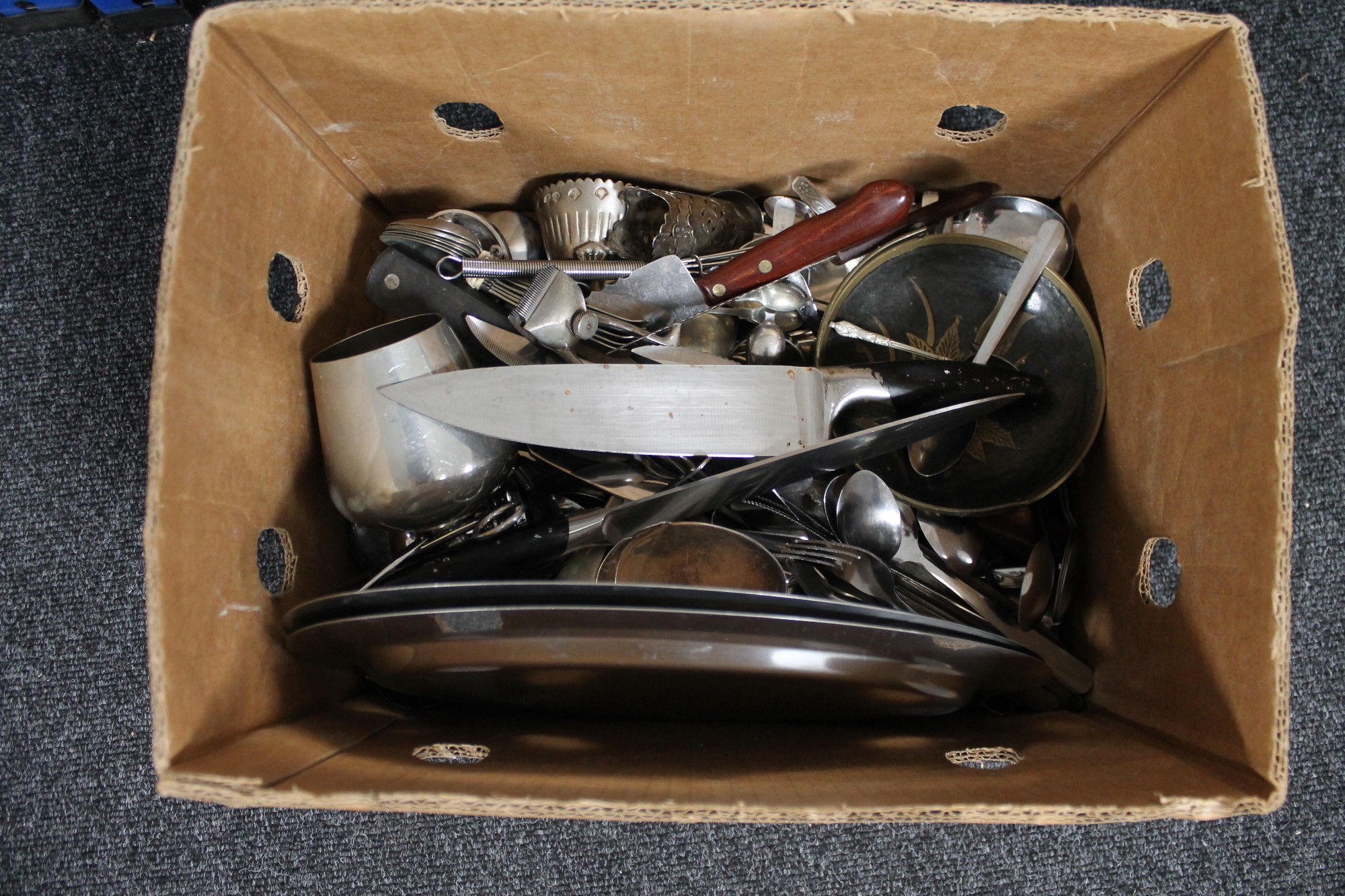 A box of a quantity of cutlery