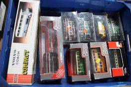 A crate of Corgi die cast vehicles,