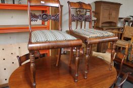A set of eight 19th century mahogany dining room chairs.