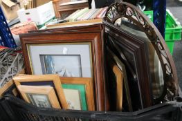 A crate of pictures and prints,