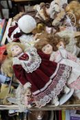 Two crates of ceramic and other twentieth century dolls