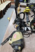 A Ryobi petrol strimmer