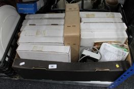 A box of decorative china plates in box