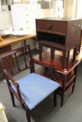 A mahogany single door cabinet, a chair and a three tier stand.