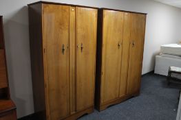 Two walnut double door wardrobes