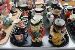 A tray of fourteen ceramic character jugs (14)