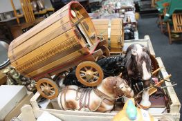 A crate of shire horse ornaments,