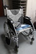 An Enigma ultra lightweight electric wheel chair with battery