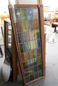 Two leaded glass panelled doors and a small collection of mirrors.