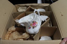 A box containing Richmond tea china