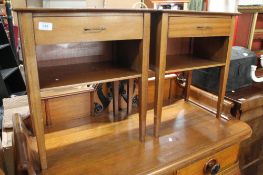 A pair of mid century beech bedside cabinets.