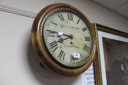 A 19th century mahogany circular dial wall clock signed G.
