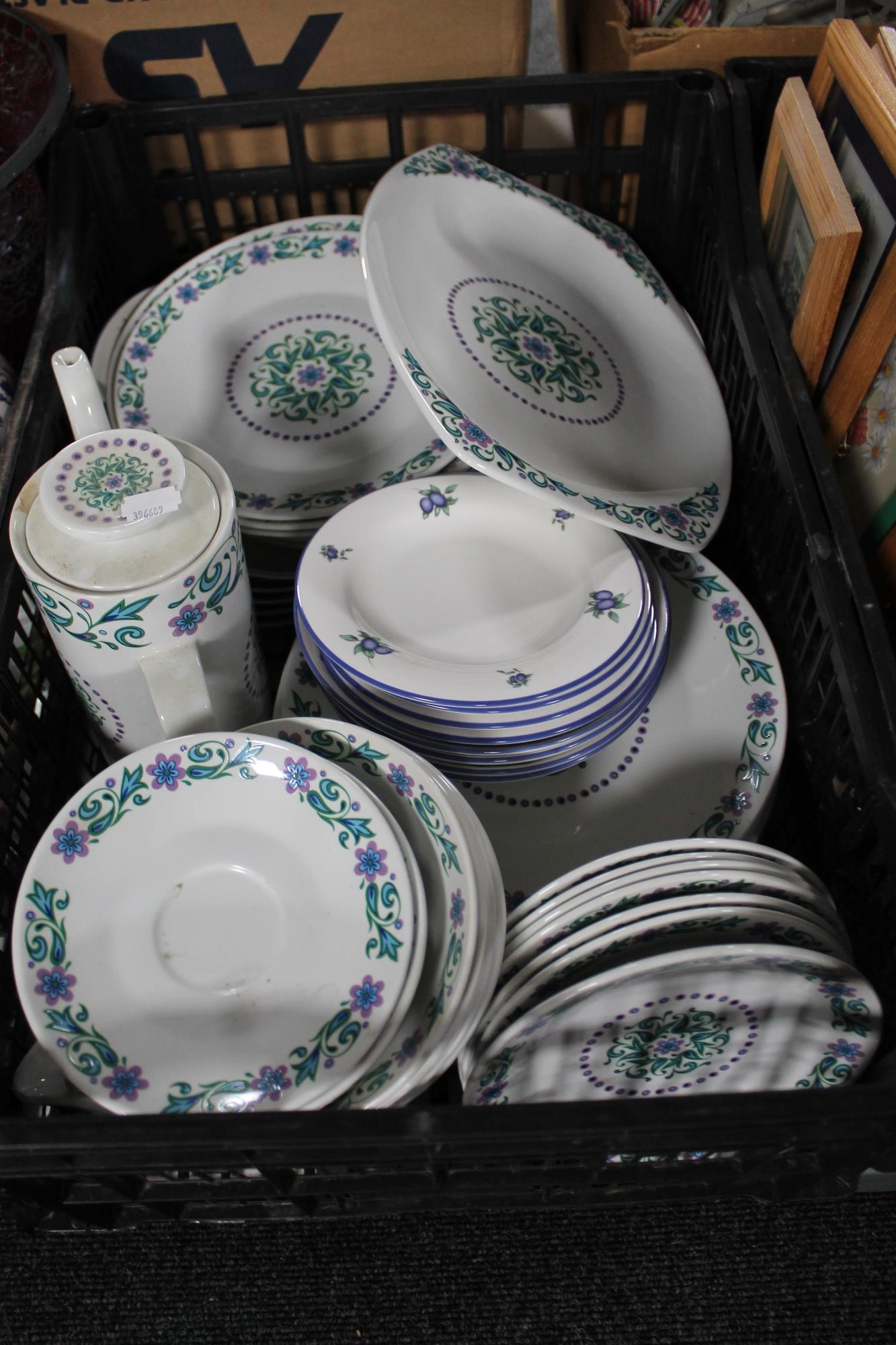 A tray of Meakin Studio tea and dinner ware,