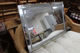 A contemporary all glass mirror,