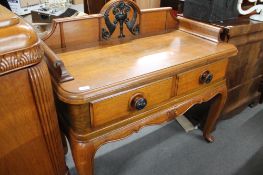 An early 20th century oak two drawer side table.