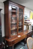 A nineteenth century mahogany bureau bookcase CONDITION REPORT: 129cm wide by 52cm