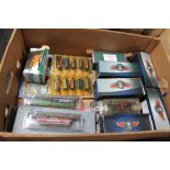 A box of die cast vehicles,