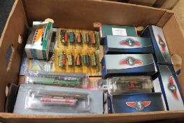 A box of die cast vehicles,