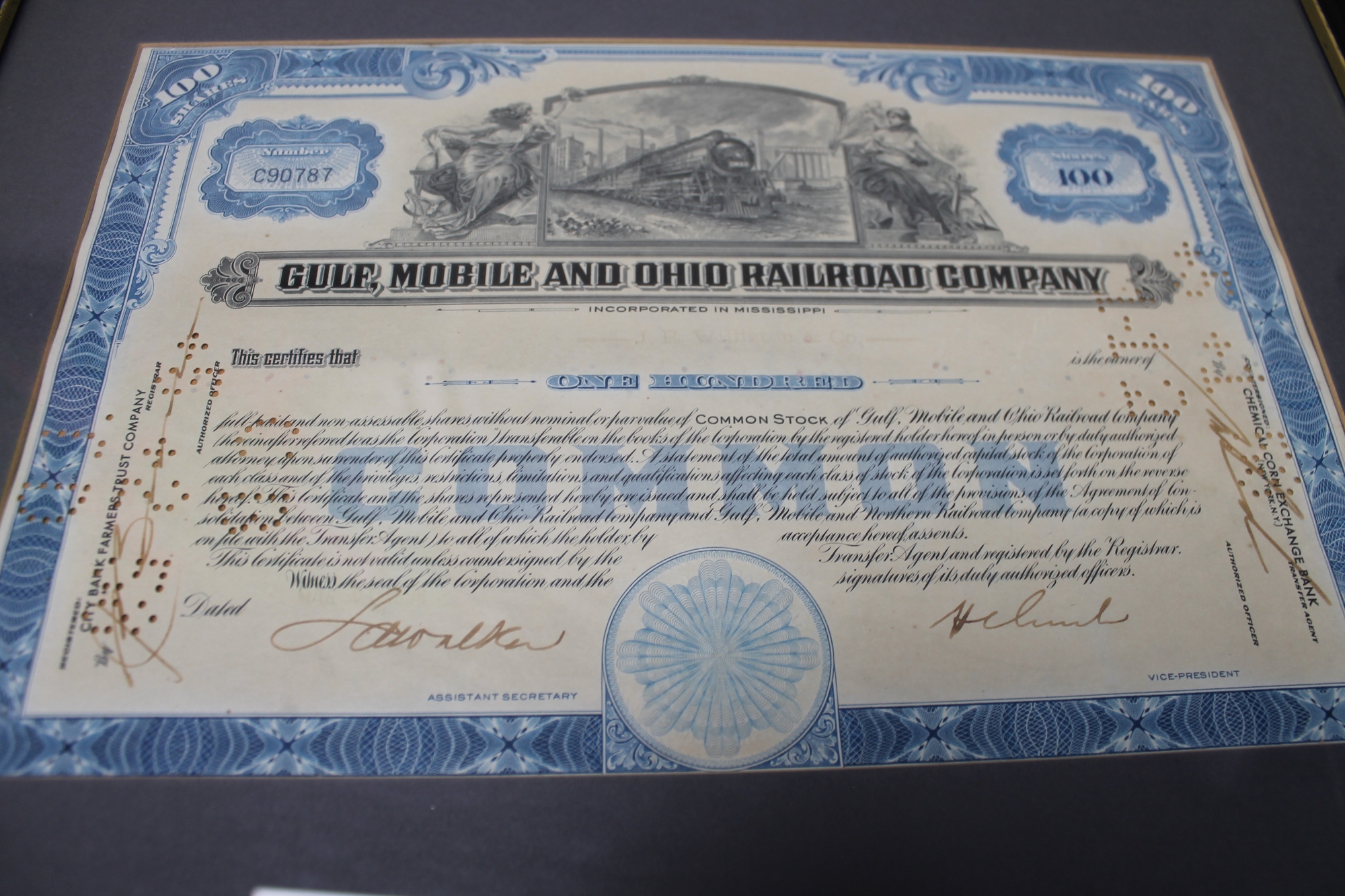 Two framed share certificates - The Gulf Mobile and Ohio railroad company and a further 19th