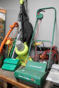 An electric lawn raker together with garden vac, strimmer,