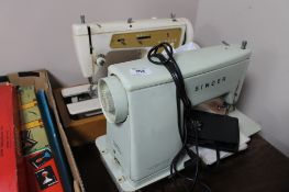 Two electric sewing machines