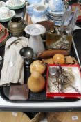 A tray of cutlery, wooden fruit, costume jewellery,