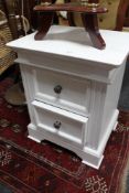 A contemporary white two drawer chest