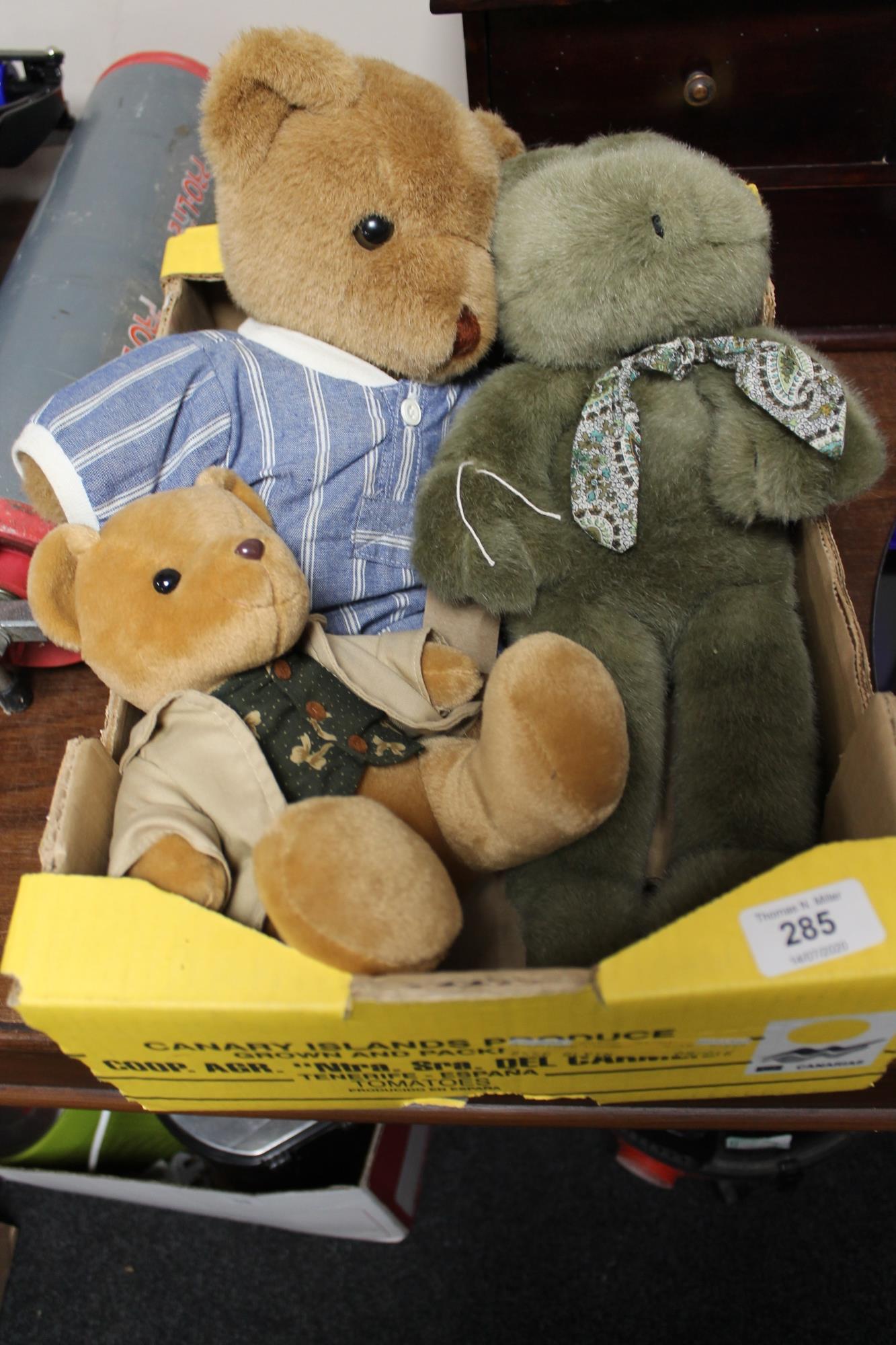An English Toy Company teddy bear together with two other bears