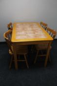 A pine kitchen tiled table and four chairs