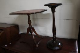 A small pedestal occasional table and a smoker's stand.