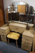 An early twentieth century mirrored dressing table with stool and matching 3/4 size bed with