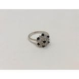An 18ct gold sapphire and diamond ring, size K CONDITION REPORT: 3.2g.