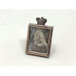 An antique miniature silver easel photograph frame showing Queen Victoria, Birmingham 1900,