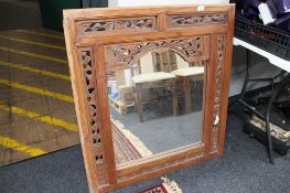 A hardwood fret work mirror