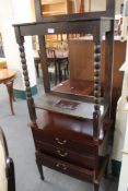 A mahogany three drawer chest and an oak stick stand.