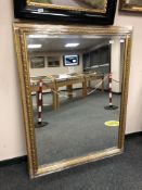 A golden framed mirror