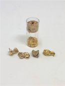 A quantity of dental gold (13.6g), together with a further glass vial containing dental gold.