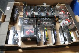 A tray of Formula One racing vehicles,