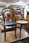 Two Bentwood style cafe chairs.