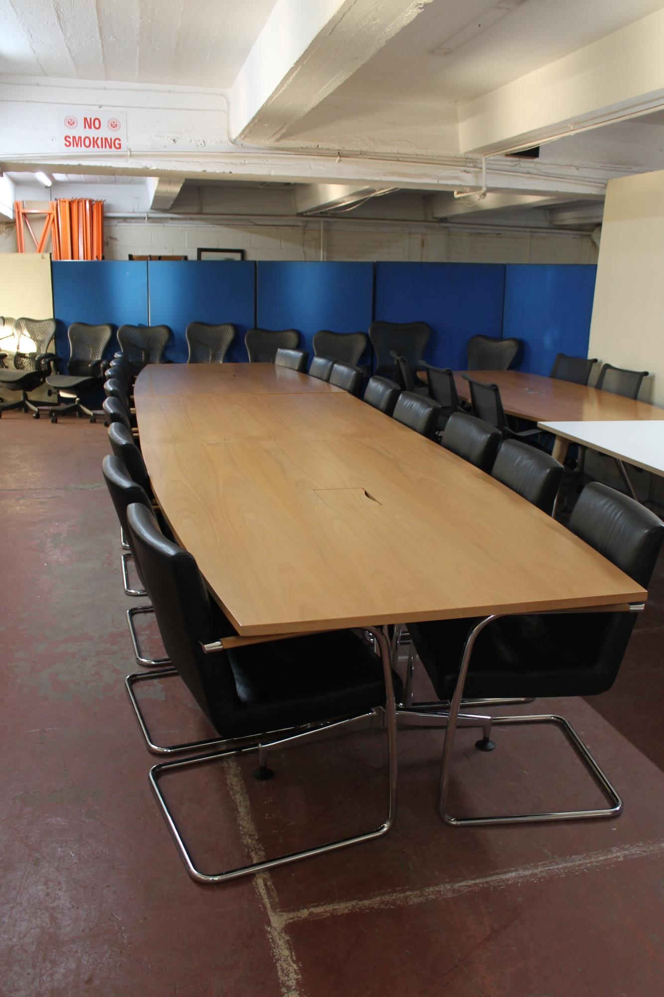 A triple section boardroom table in a walnut finish, length 540 cm,