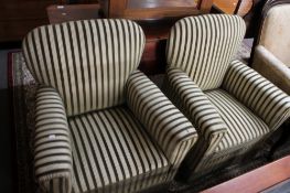 A pair of 19th century armchairs in green two tone stripe.