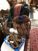 Two fur coats together with a quantity of furs