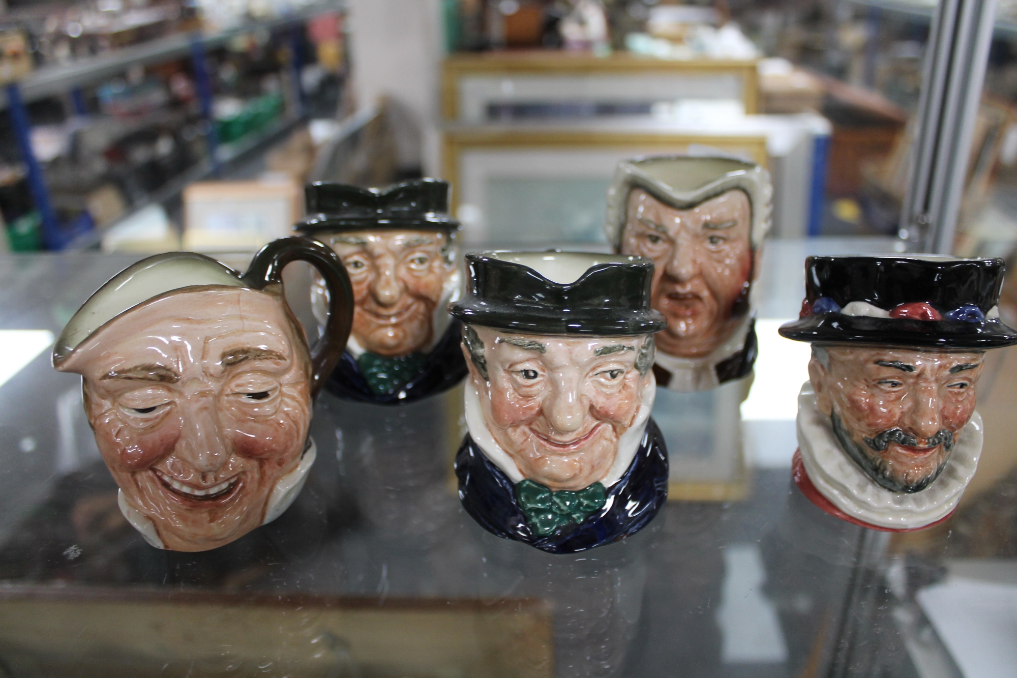 Five Royal Doulton character jugs including The Beefeater (5)